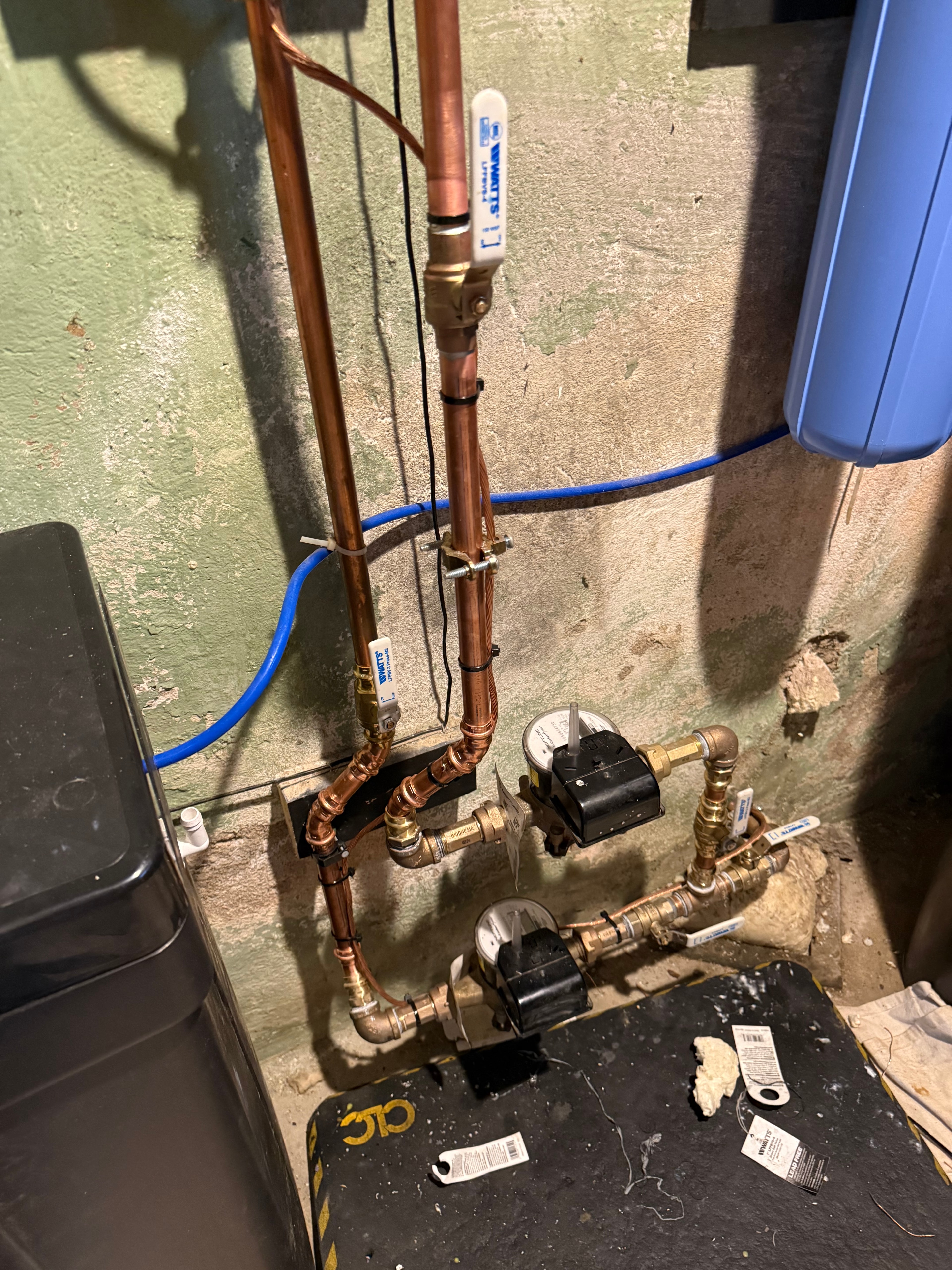 Two water meters re-set on new copper pipework with full-port ball valves either side